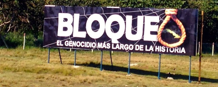 Cartel cubano que denuncia el bloqueo a la isla